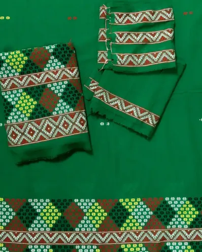 Green Mising mekhela sador with blouse piece, guti phul buta, Mising ghai phul, Mising pari, and white tassels