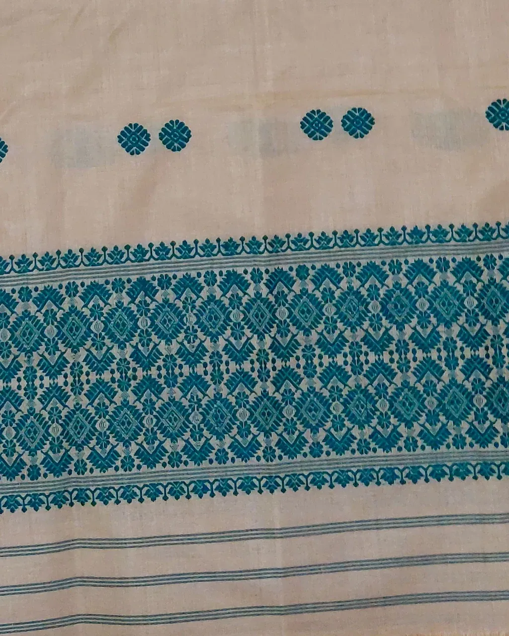Golden Toss silk single sador with teal floral butas and teal geometric ghai phul border