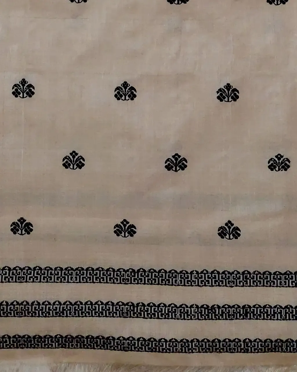 Golden Toss silk borderless single sador with black xoru phul buta and simple black stripe end