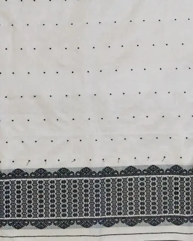 White Toss mekhela sador jura with black xoru buta, stitched black phulam pari, blouse piece, and stripe end