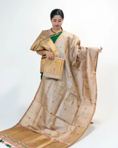 Guna Black Toss mekhela sador with blouse piece, golden guna phul buta, stitched phulam pari, ready-to-wear dohi bota, and bridal ghai phul work