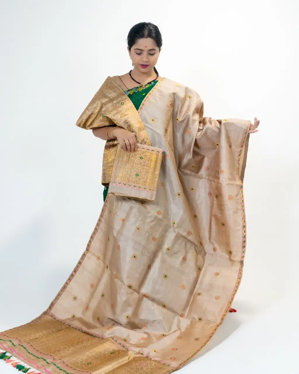 Guna Black Toss mekhela sador with blouse piece, golden guna phul buta, stitched phulam pari, ready-to-wear dohi bota, and bridal ghai phul work