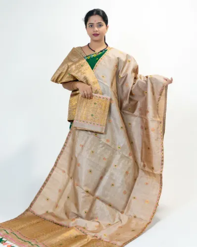 Guna Black Toss mekhela sador with blouse piece, golden guna phul buta, stitched phulam pari, ready-to-wear dohi bota, and bridal ghai phul work