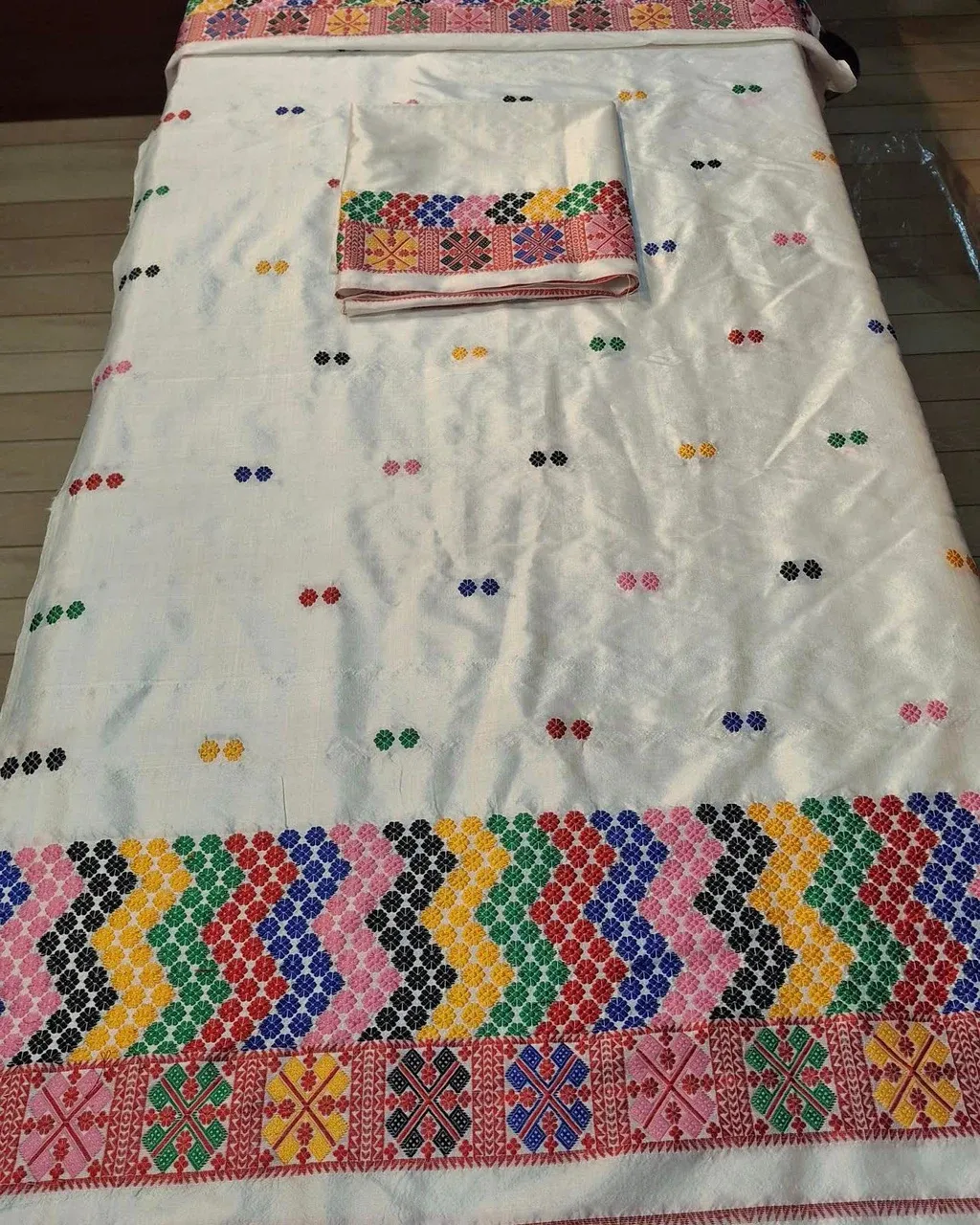Close-up of handwoven Assamese textile work