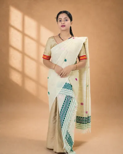 Natural beige ghisa cotton single sador with green and pink motifs, ghai phul, and dohi
