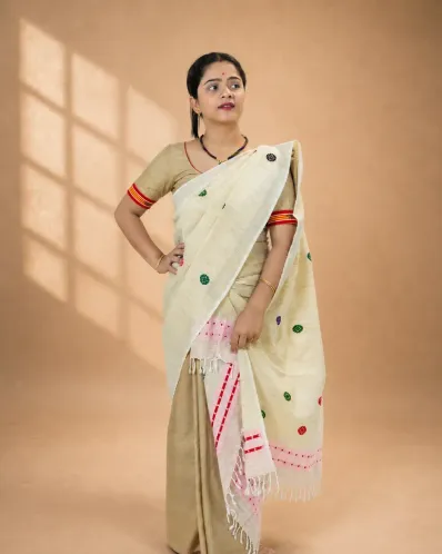 Natural beige ghisa cotton single sador with multi-coloured buta, pink ghai phul, and dohi