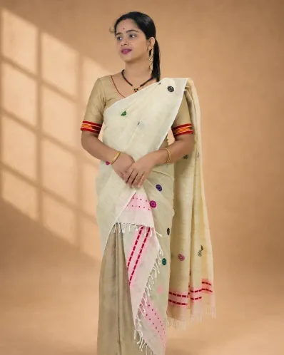 Natural beige ghisa cotton single sador with multi-coloured buta, pink ghai phul, and dohi