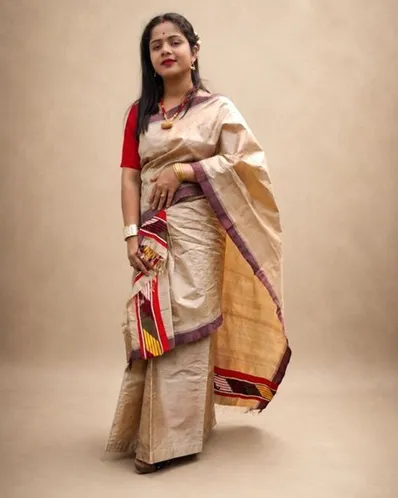 Toss Riha with Kesh Bosa design draped on a model