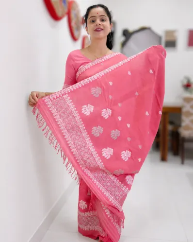 Pink Kesa Paat cotton mekhela sador jura with silver-white xoru phul buta, gos pata buta, broad ghai phul, xoru phul pari, and matching blouse