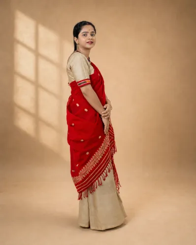 Red Kesa Paat Cotton single sador with golden zari ghai phul, butas, and dohi