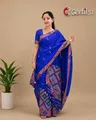 Blue Mising mekhela sador jura with colourful guti phul, Mising ghai phul, broad Mising pari, parboti work, and matching blouse piece