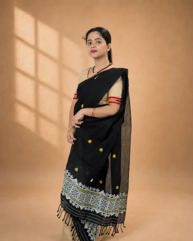 Black Nooni Cotton single sador with green and white ghai phul, multi-coloured butas, and dohi
