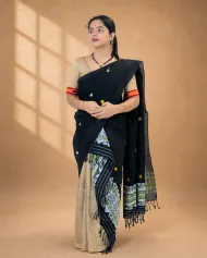 Black Nooni Cotton single sador with green and white ghai phul, multi-coloured butas, and dohi