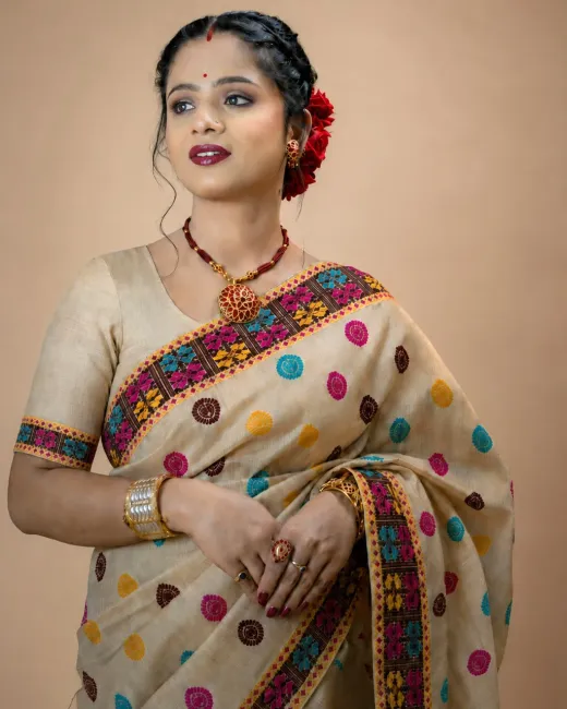 Handwoven Toss Mekhela Chador featuring traditional Assamese motifs on pure Tussar silk