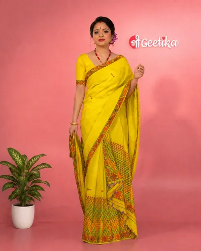 Yellow Mising mekhela sador jura with blouse piece, colourful guti phul, Mising ghai phul, and Mising pari